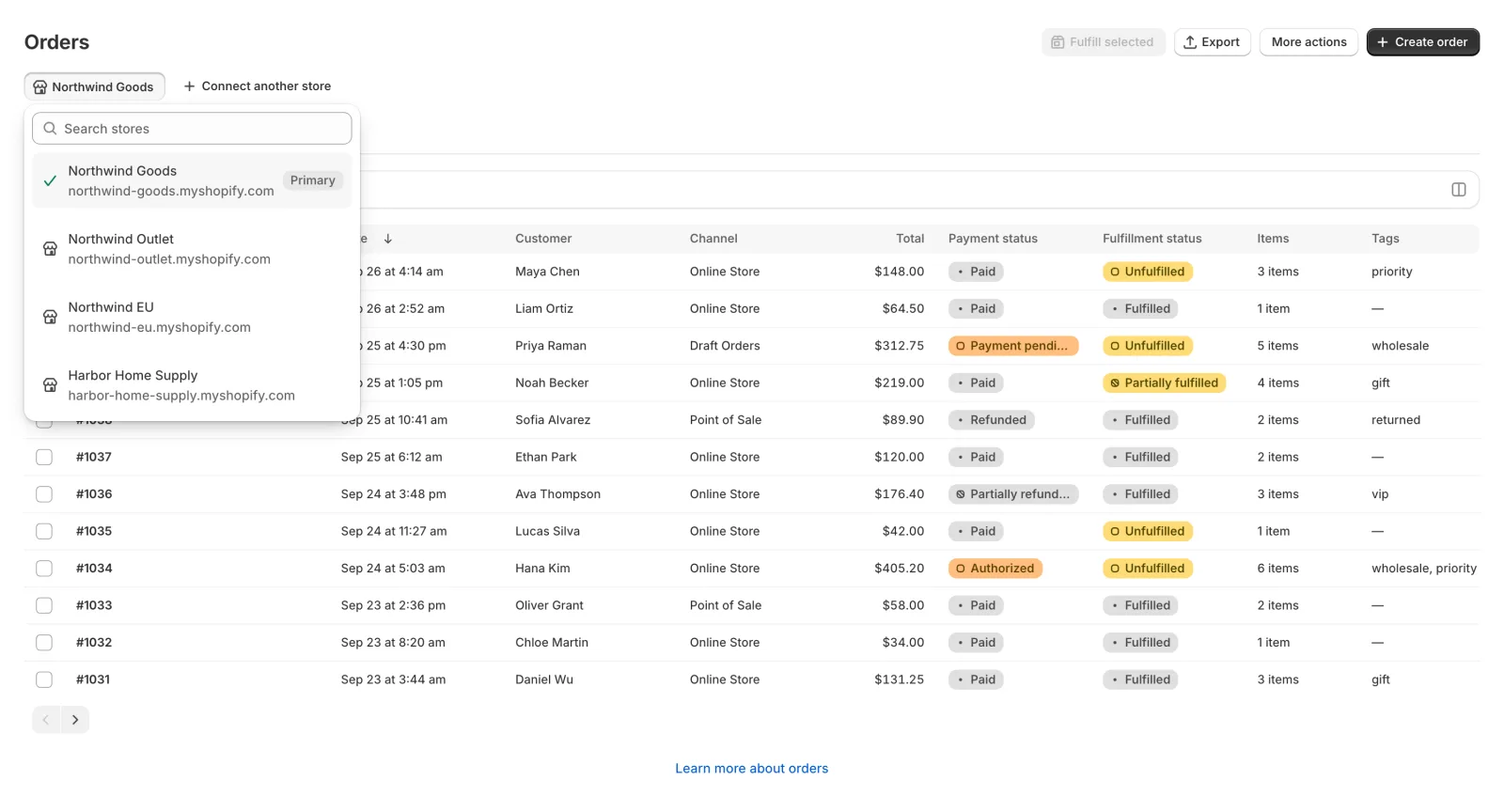The store switcher in Storefleet Store Ops listing four linked stores, one marked Primary.